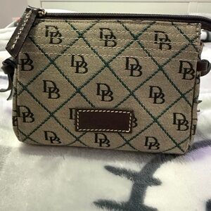 Authentic Dooney and Burke mini cosmetic bag